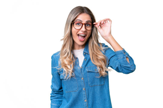 Young Uruguayan woman over isolated background showing ok sign with fingers