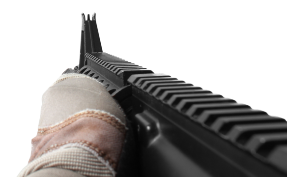 hand holding assault rifle gun aiming in subjective point of view POV isolated on white background in fire weapon use and war crime and violence concept