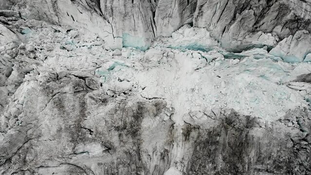 Aerial view over the Moiry glacier near Grimentz in Valais, Switzerland with a top down view of the icy crevasses