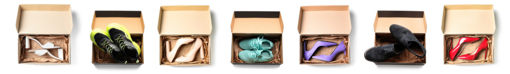 Set of cardboard boxes with stylish shoes isolated on white, top view