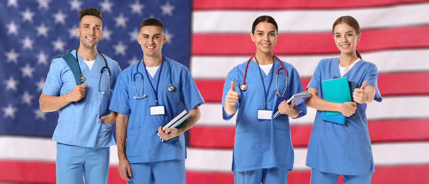 Portrait of nurses against USA flag