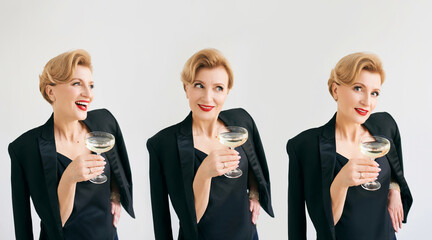 three mature stylish elegant women twins in tuxedo with glass of sparkling wine. Party, celebration, anti age concept 