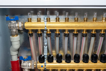 New brass manifold for underfloor heating systems with magnetic rotameters and manual knob.