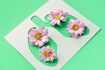Paper lungs with flowers on green background
