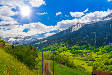 Naklejka na ściany i meble Railway in Alps mountains, Klosters-Serneus, Davos, Graubuenden