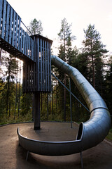 Umea, Norrland Sweden - September 10, 2022: steep slide in forest playground