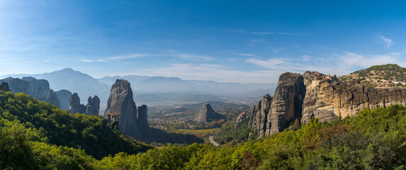 panorama landscape of the Meteora rock formations with the Saint Nikolaos monastery