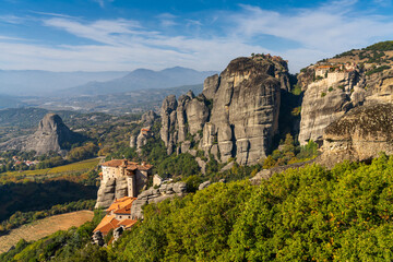 landscape of the Meteora rock formations with the Saint Nikolaos monastery