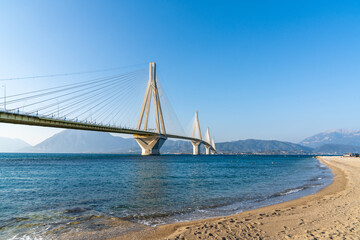 landscape view of the landmark Rio-Antirio Bridge across the Gulf of Corinth