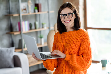 Portrait of joyful positive cheerful cute lady chief journalist writing editing news newscast information work modern workplace indoors