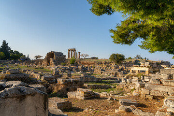 Fototapeta na wymiar view of the ruins of Ancient Corinth in southern Greece with the Temple of Apollo in the background