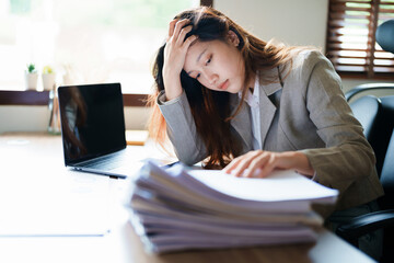 Portrait of sme business owner, man using computer and financial statements Anxious expression on expanding the market to increase the ability to invest in business