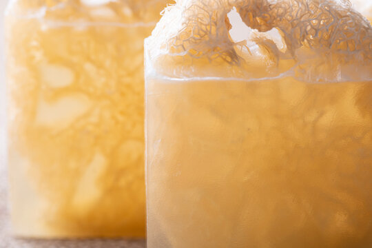 Soap with loofah sponge inside. Glycerin soaps with natural scrub.