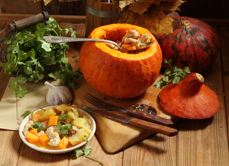 Pumpkin with meat and vegetables, cooked whole in the oven