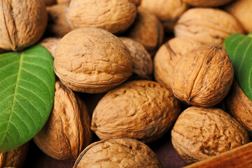 Fresh walnuts as background, closeup