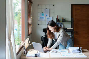 financial, Planning, Marketing and Accounting, portrait of Asian employee checking financial...