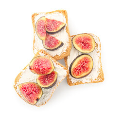 Tasty bruschettas with cream cheese and figs on white background
