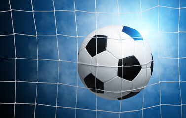 Soccer ball in goal on blue