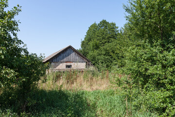 Fototapeta na wymiar Old wooden barn. Rural courtyard 