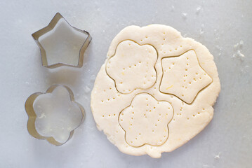 Shortbread cookies on a table with die cut molds