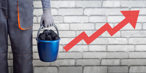 Man worker with bucket of coal and growth chart. concept of increase production price export import...
