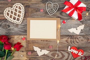 Envelope and blank paper on wooden background, Valentine's day concept.