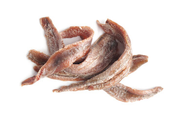Heap of delicious anchovy fillets on white background, top view