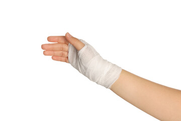 Woman with hand wrapped in medical bandage on white background, closeup