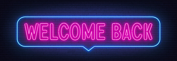 Welcome Back neon sign in the speech bubble on brick wall background.