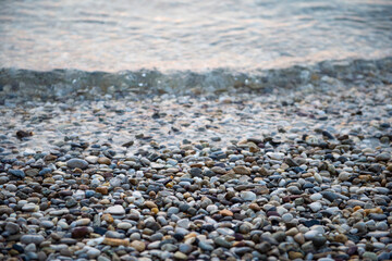 Waves washing over gravel beach