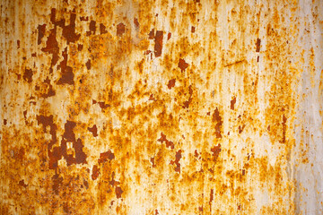 Texture of rusty iron, cracked paint on an old metal surface. Sheet of rusty metal with cracked and peeling paint, background for design with copy space.