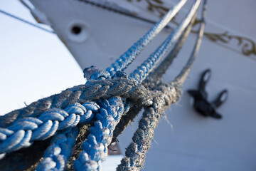 The ropes in the background the bow of the ship