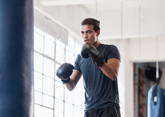 Fitness, training and boxing with man in gym for workout, exercise and sports stamina. Cardio,...