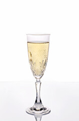 Champagne glass on white background