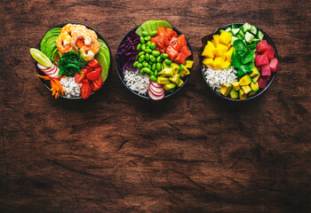 Hawaiian poke bowl set: tuna, salmon, shrimp with avocado, mango, radish, rice and other...