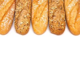 Assortment of baked bread baguette isolated on white background