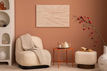 Fototapeta na wymiar Creative composition of living room interior with mock up poster frame, stylish armchair, white pouf, orange coffee table, plaid, vase with rowan, book and personal accessories. Home decor. Template.