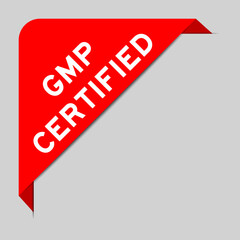 Red color of corner label banner with word GMP (Good manufacturing practice) certified on gray background