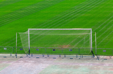 Football gate at the stadium , grass area at background . Lawn football terrain stadium