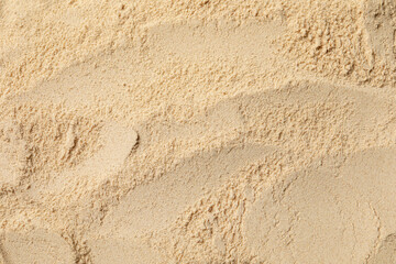 Heap of buckwheat flour as background, top view