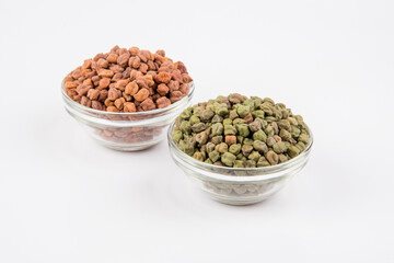 Black Chickpeas or Kala Chana with chana dal pulse isolated on wooden Background.