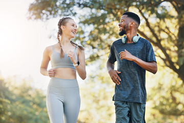 Couple, training and outdoor for running for health, wellness and workout together. Man, woman and fitness in nature, for exercise and smile to relax, practice and workout for bonding and loving.