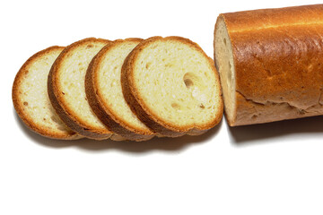 Long round baguette with slices on a white background