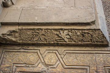 Floral Ornaments patterns carved into the exterior wall of Sultan Hasan Mosque, Cairo, Egypt

