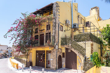 The blooming bourgainvillea covers much of this property in the old town of Chania, Crete