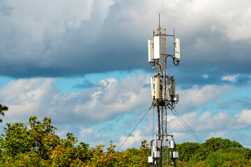 A powerful cell tower with a large number of antennas, transmitters and mobile repeaters.
