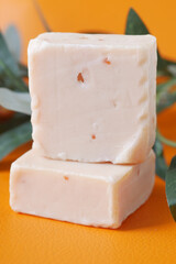 Homemade natural soap bar on black background 