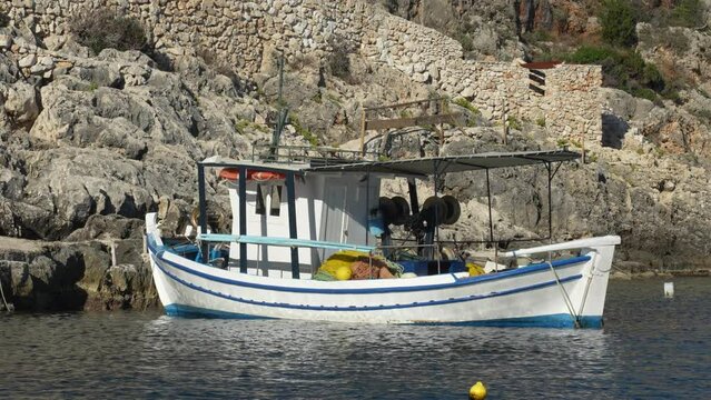 white greek wooden fishing boat