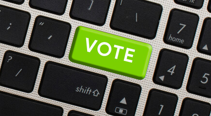 Vote written on black keyboard. vote or voting concepts, through computer or internet