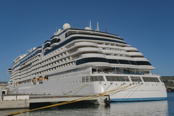 Regent luxury cruiseship or cruise ship liner Splendor arrival into Marseille Provence port during sunrise twilight blue hour Mediterranean cruise dream vacation